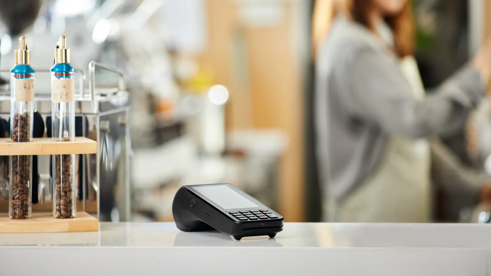 Card payment terminal on a café counter